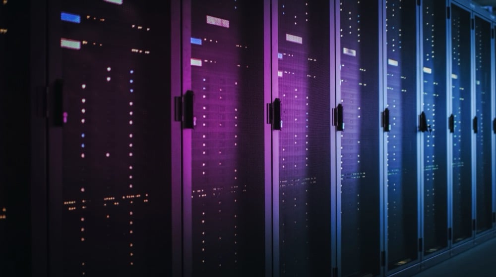 Data center server racks in a dark aisle, cooled by systems using US Valve check valves