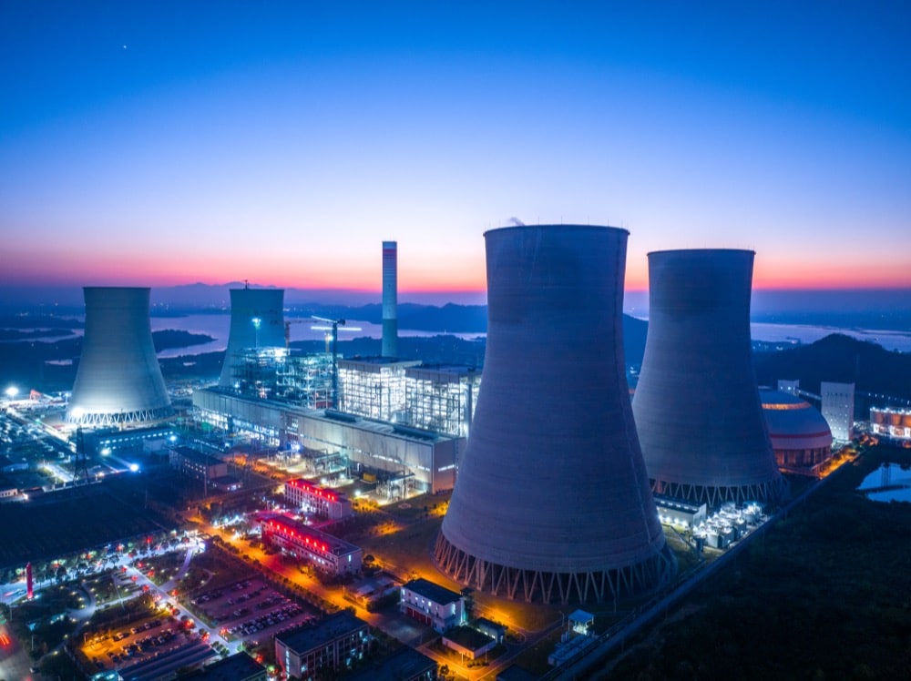 Power generation plant cooling towers at sunset